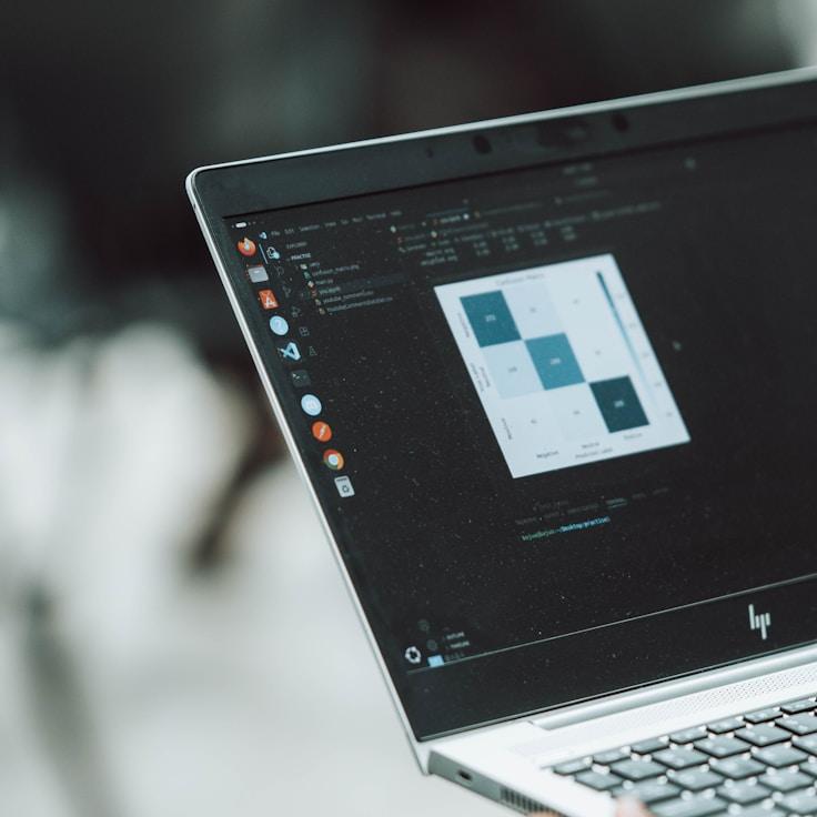 Mobile app project planning workspace with devices and development tools